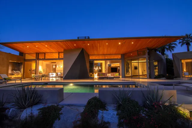 a view of a living room and dining room