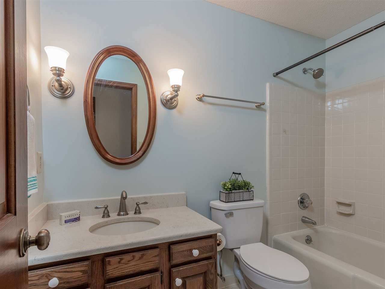 8701 Brandon Station Road Raleigh, NC 27613 - Photo 21 of 30 Quartz counter tops and convenient access to second and third bedrooms. Second Bath