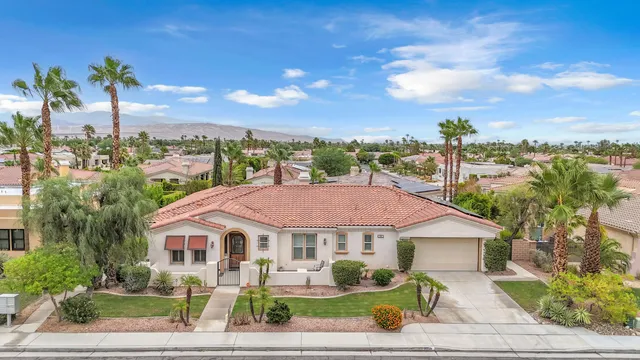 an aerial view of residential houses and city view