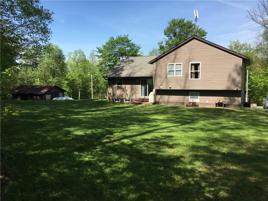 704 Red Mill Road Kittanning, PA 16201 - Photo 9 of 25 View from large, level back yard looking at back of house and garage!