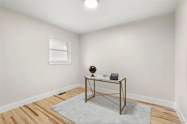 a room with a window and a table