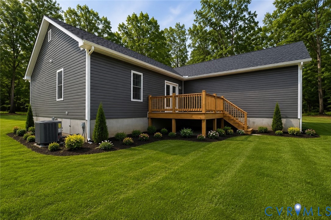 1 Tabscott Road Kents Store, VA 23084 - Photo 41 of 42 Dark gray horizontal siding with white trim, a woo