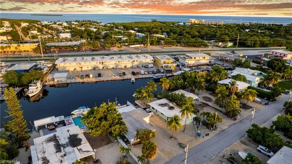 a view of a city and ocean