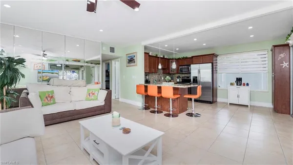 a living room with furniture and a table