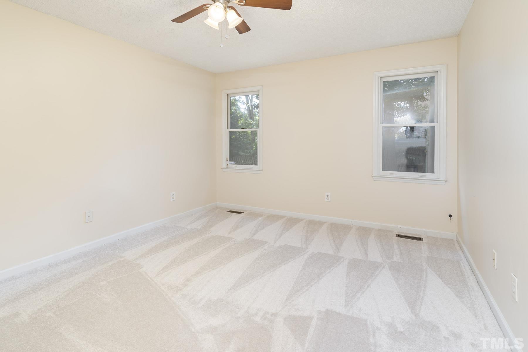 4105 Old Coach Road Raleigh, NC 27616 - Photo 12 of 22 an empty room with a window