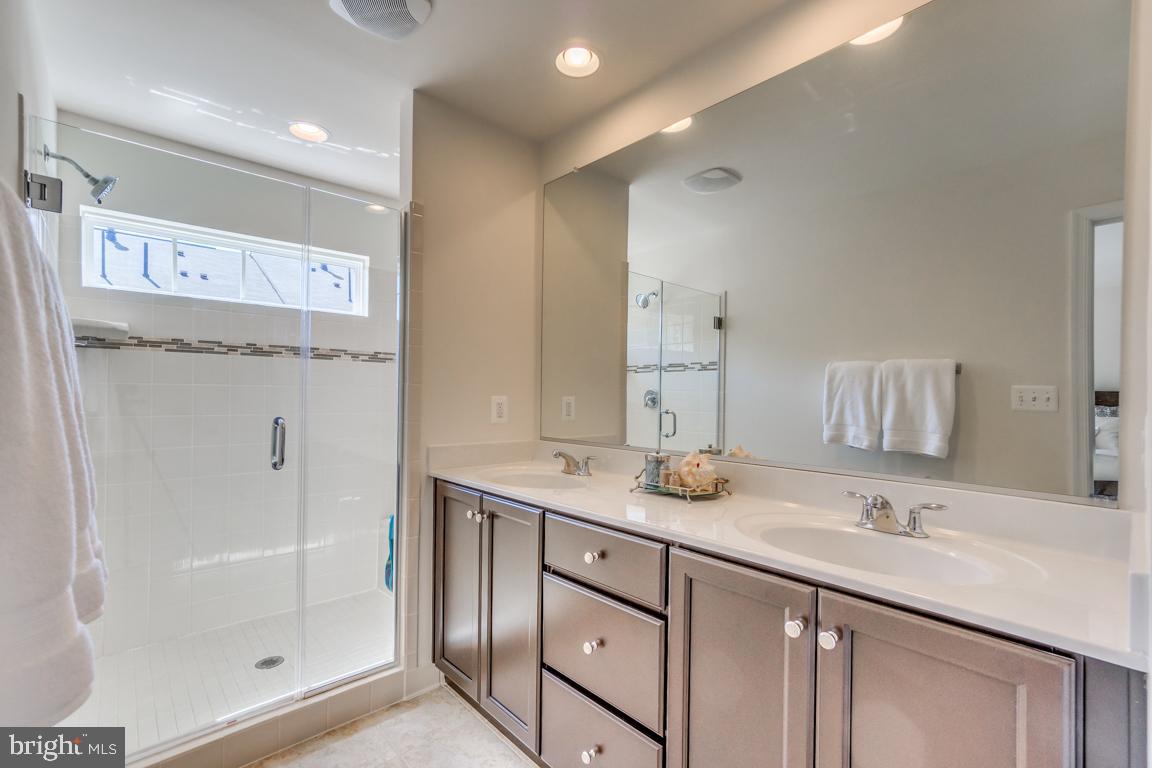 8934 Dahlgren Ridge Road Manassas, VA 20111 - Photo 21 of 41 Over sized shower and double sinks in Master bath.