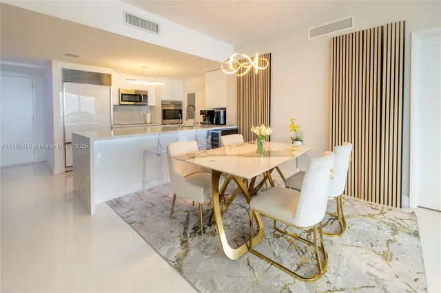 a view of a dining room with furniture