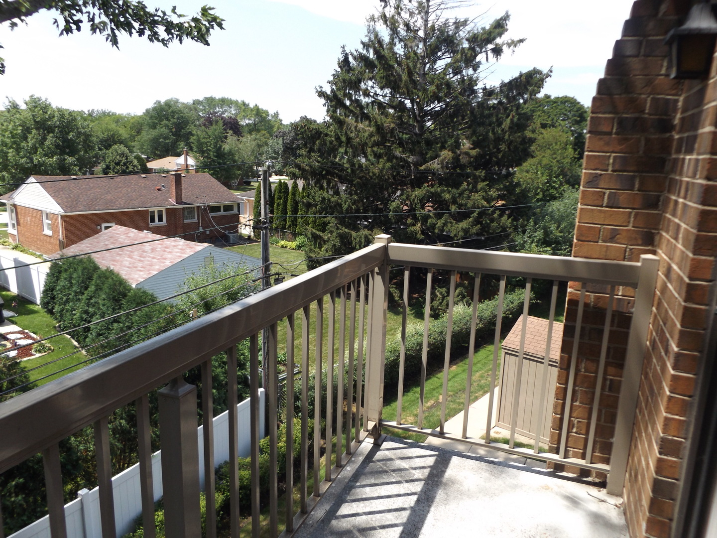 613 West Central Road, Unit C1 Mount Prospect, IL 60056 - Photo 13 of 14 a view of balcony with deck and wooden floor