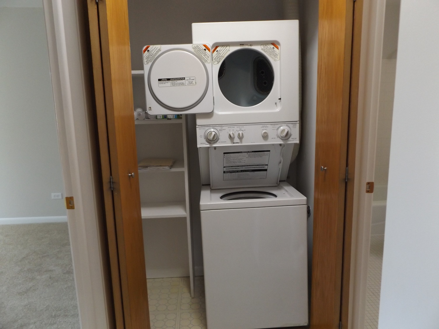 613 West Central Road, Unit C1 Mount Prospect, IL 60056 - Photo 10 of 14 a close up view of washer and dryer