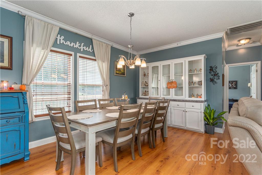150 Triple R Drive Canton, NC 28716 - Photo 6 of 44 a view of a dining room with furniture and window