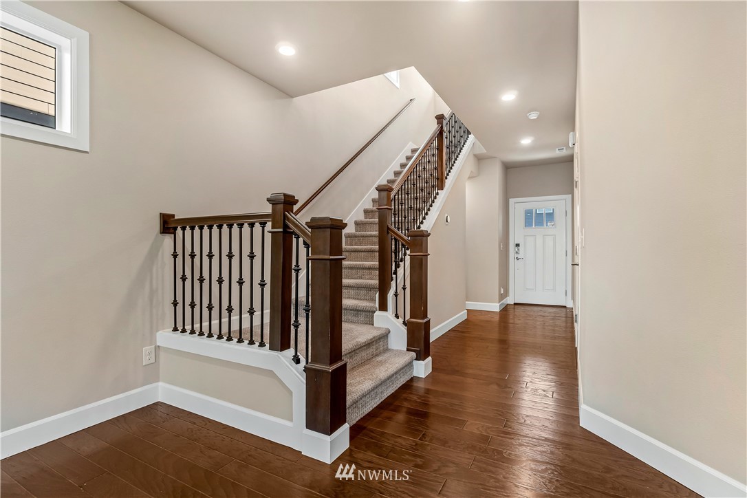 3917 174th Place Southeast Bothell, WA 98012 - Photo 14 of 31 a view of entryway with stairs and wooden floor