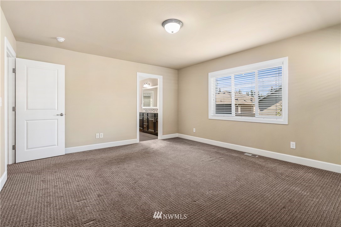 3917 174th Place Southeast Bothell, WA 98012 - Photo 18 of 31 an empty room with windows and closet