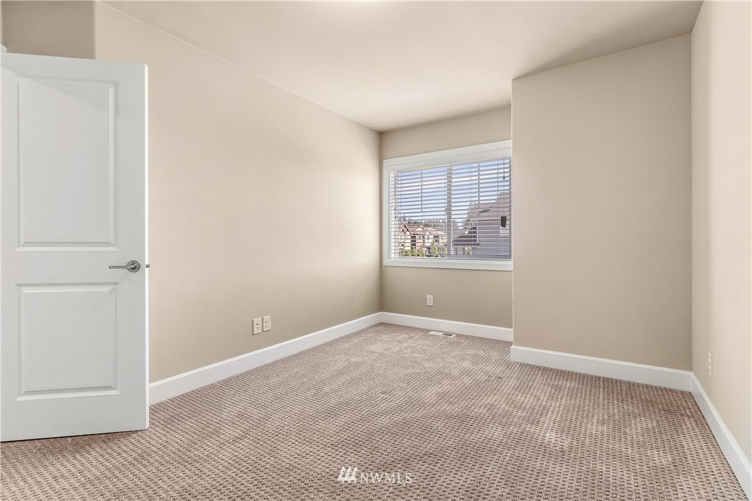 3917 174th Place Southeast Bothell, WA 98012 - Photo 22 of 31 a view of an empty room with a window