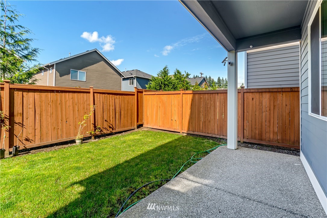 3917 174th Place Southeast Bothell, WA 98012 - Photo 26 of 31 a view of backyard with tub and trees