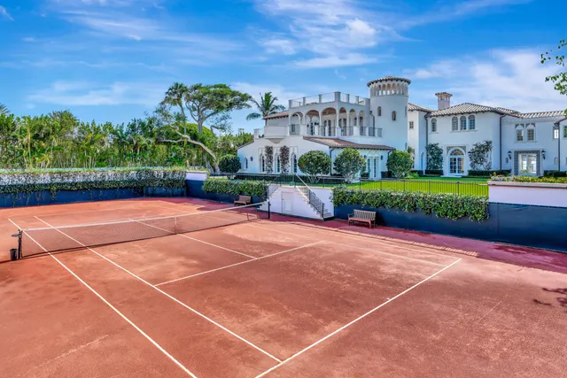 a view of yard with swimming pool and green space