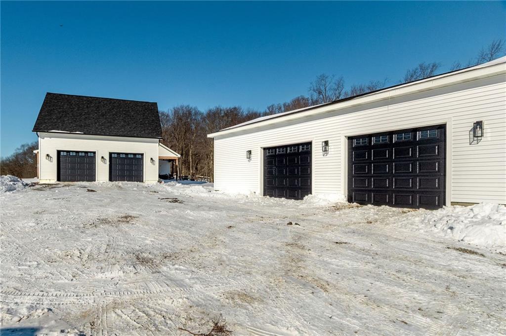 131 Conerty Road Chicora, PA 16025 - Photo 10 of 35 2 Stall Detached Garage AND a 1.5 Stall Attached Garage.