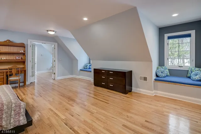 a view of staircase with rug floor