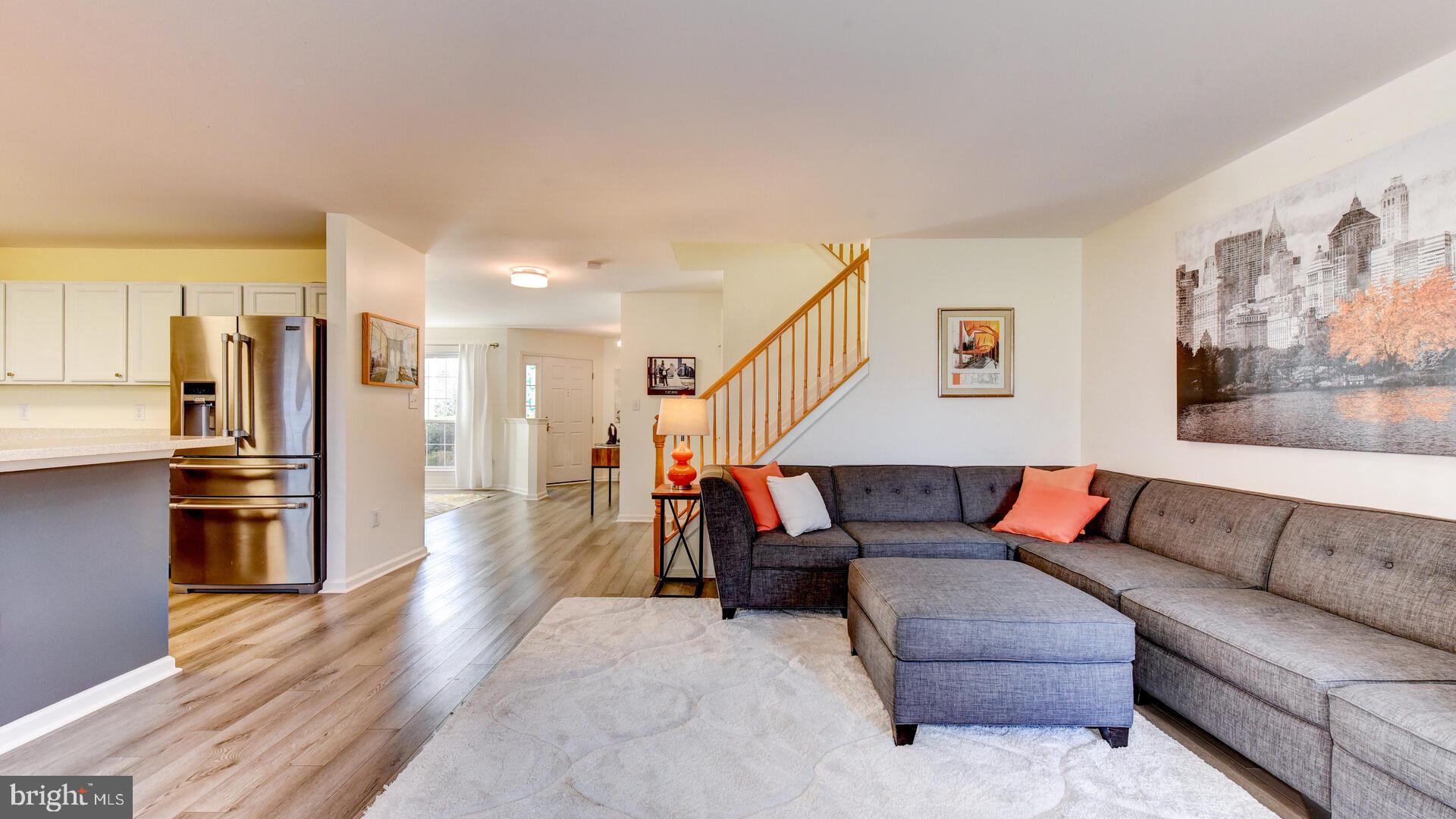 104 Coburn Road Pennington, NJ 08534 - Photo 13 of 40 a living room with furniture and kitchen view
