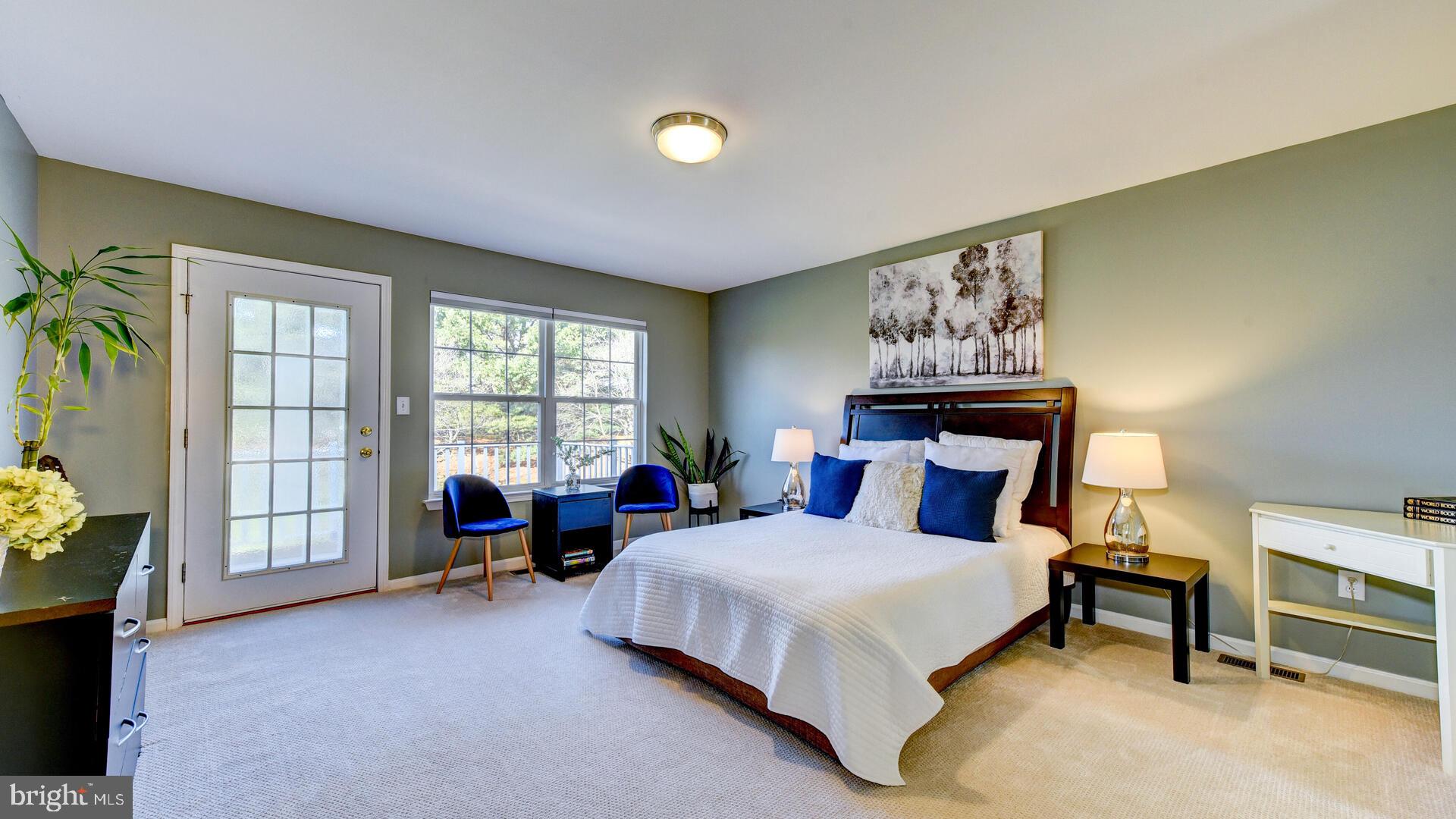 104 Coburn Road Pennington, NJ 08534 - Photo 23 of 40 a bed room with a bed and a chair