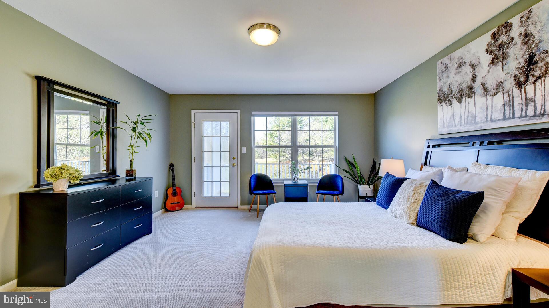 104 Coburn Road Pennington, NJ 08534 - Photo 25 of 40 a bedroom with a bed and a large window