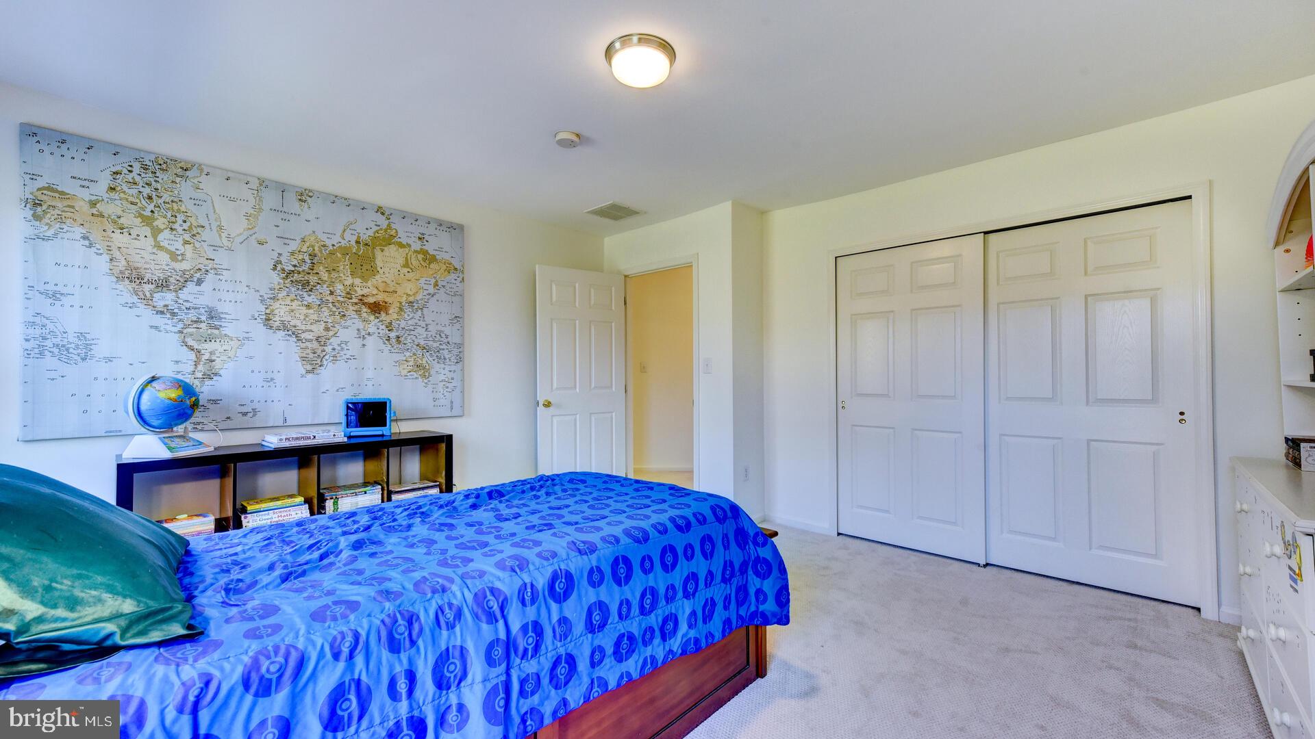 104 Coburn Road Pennington, NJ 08534 - Photo 31 of 40 a bedroom with a bed and painting on the wall