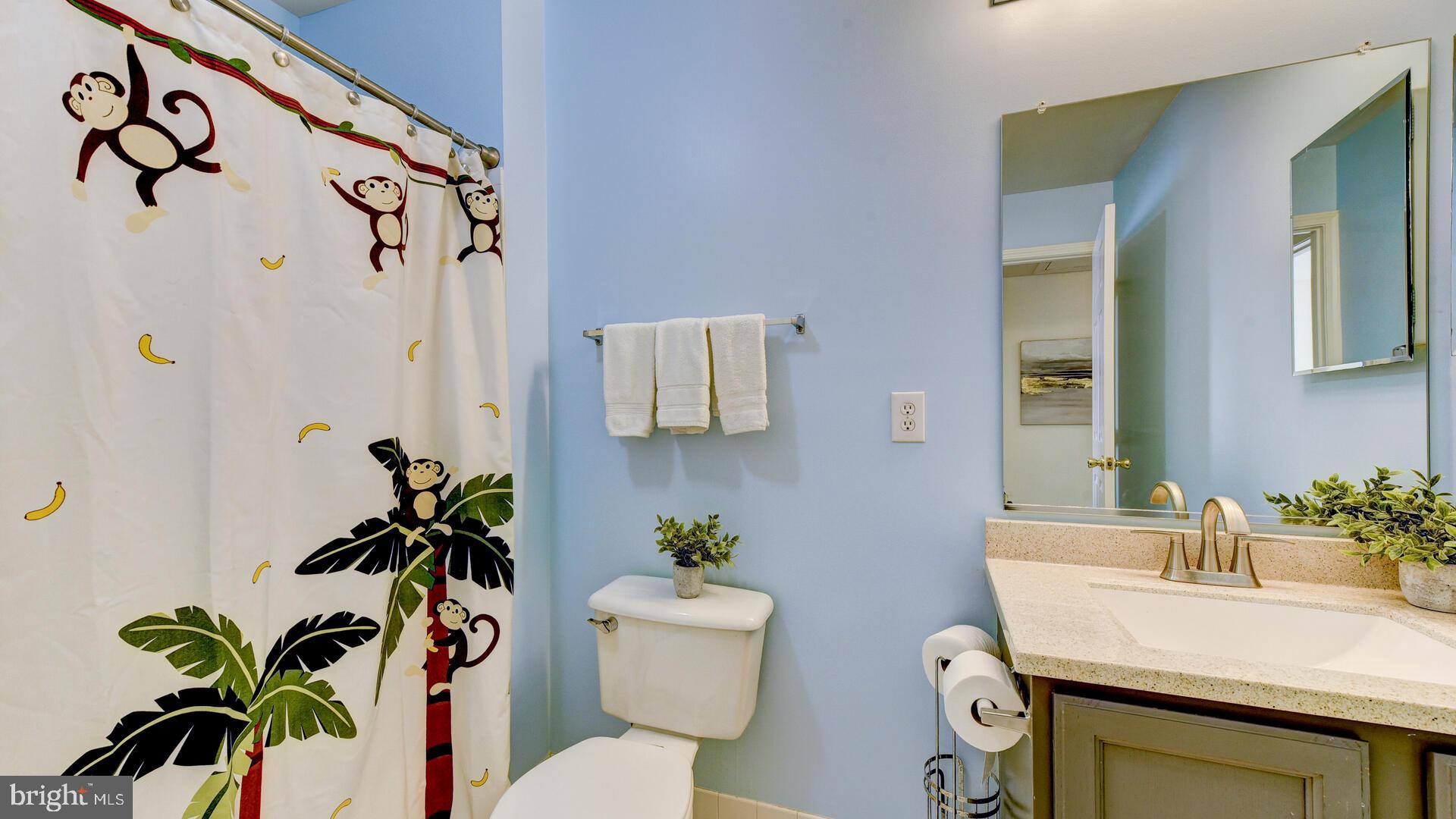 104 Coburn Road Pennington, NJ 08534 - Photo 32 of 40 a bathroom with a sink toilet and a mirror