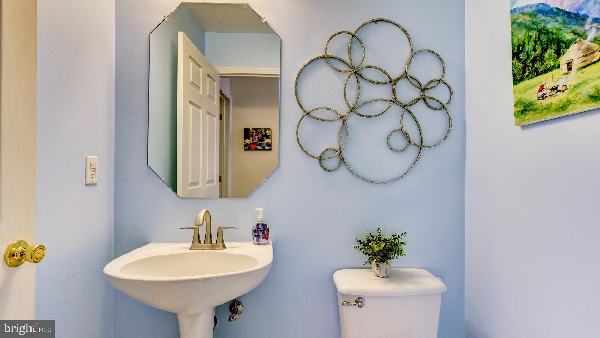 104 Coburn Road Pennington, NJ 08534 - Photo 34 of 40 a bathroom with a sink and a mirror