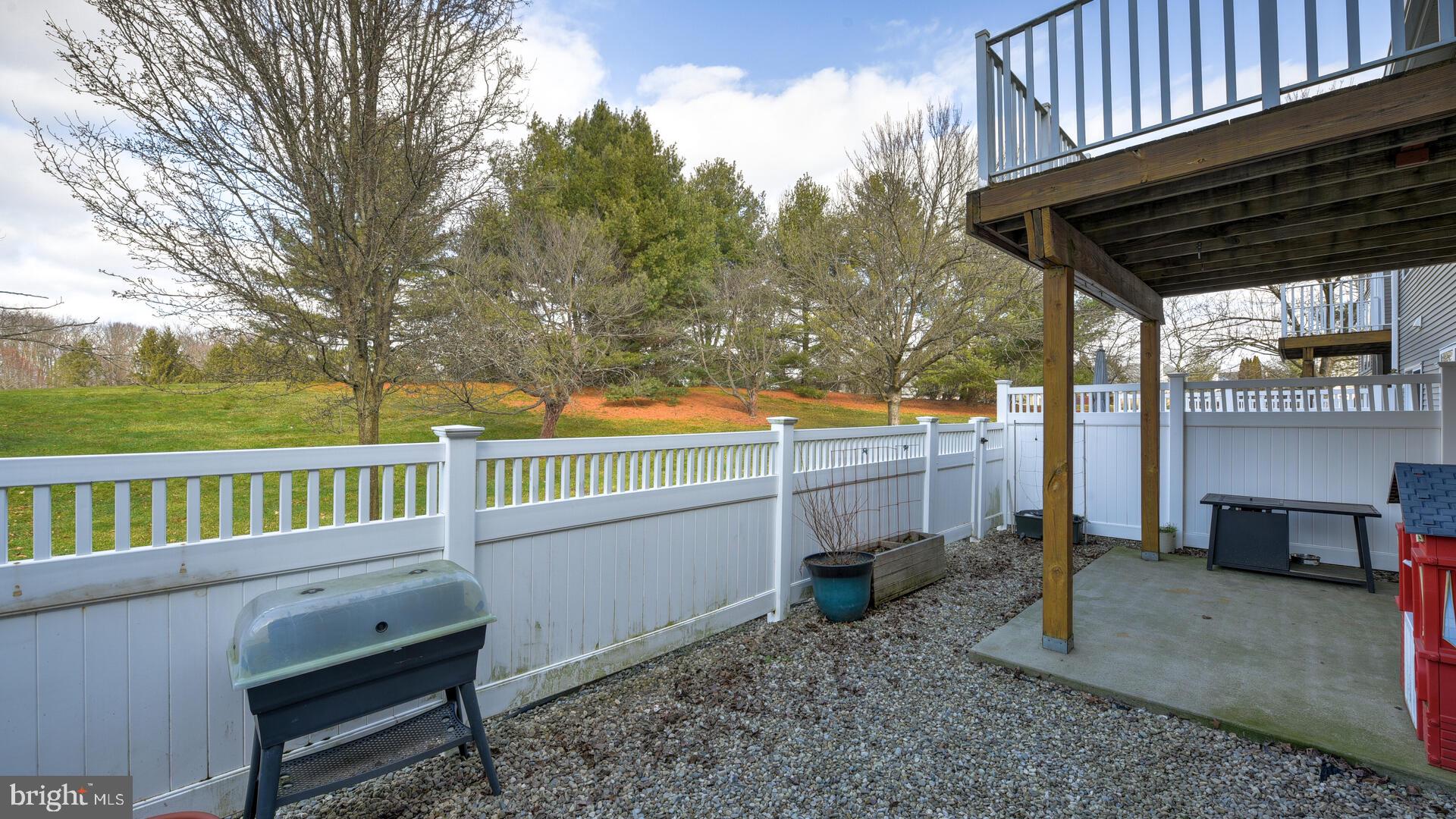 104 Coburn Road Pennington, NJ 08534 - Photo 37 of 40 a view of a porch with furniture and a yard