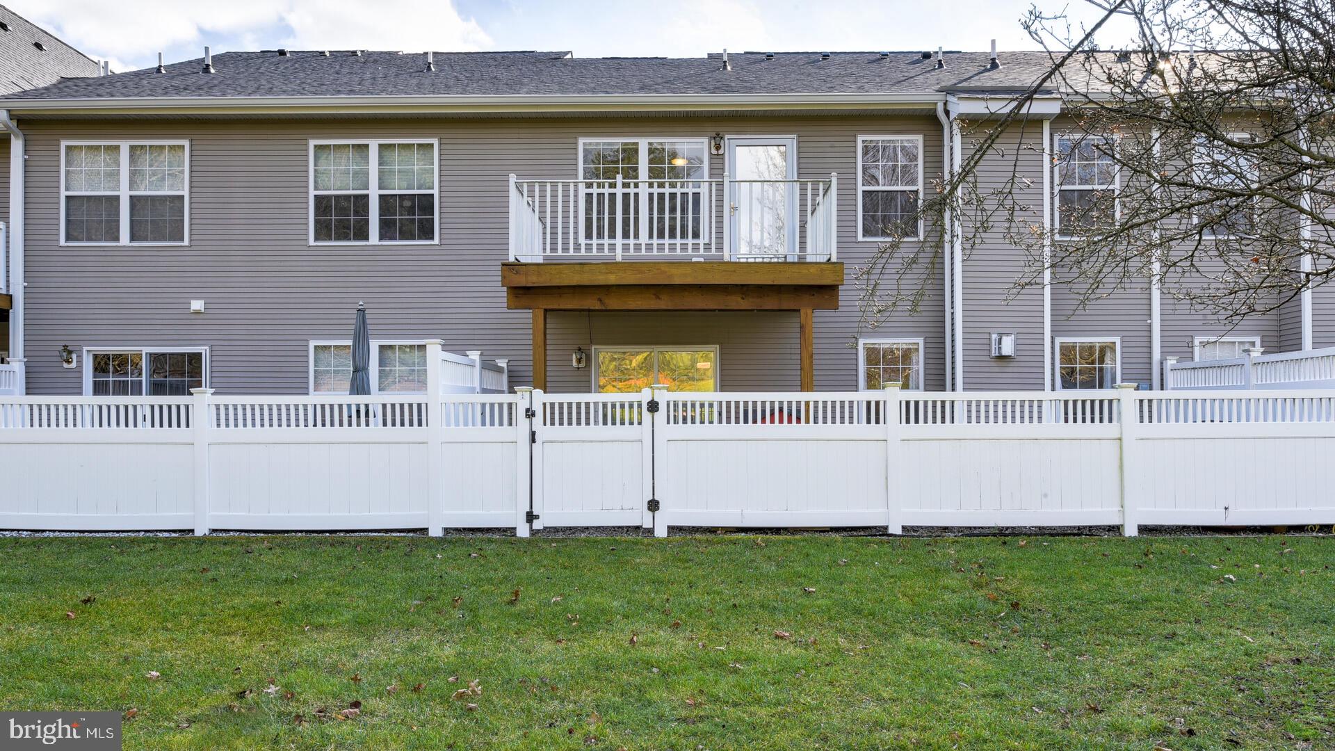 104 Coburn Road Pennington, NJ 08534 - Photo 38 of 40 a front view of a house with a yard