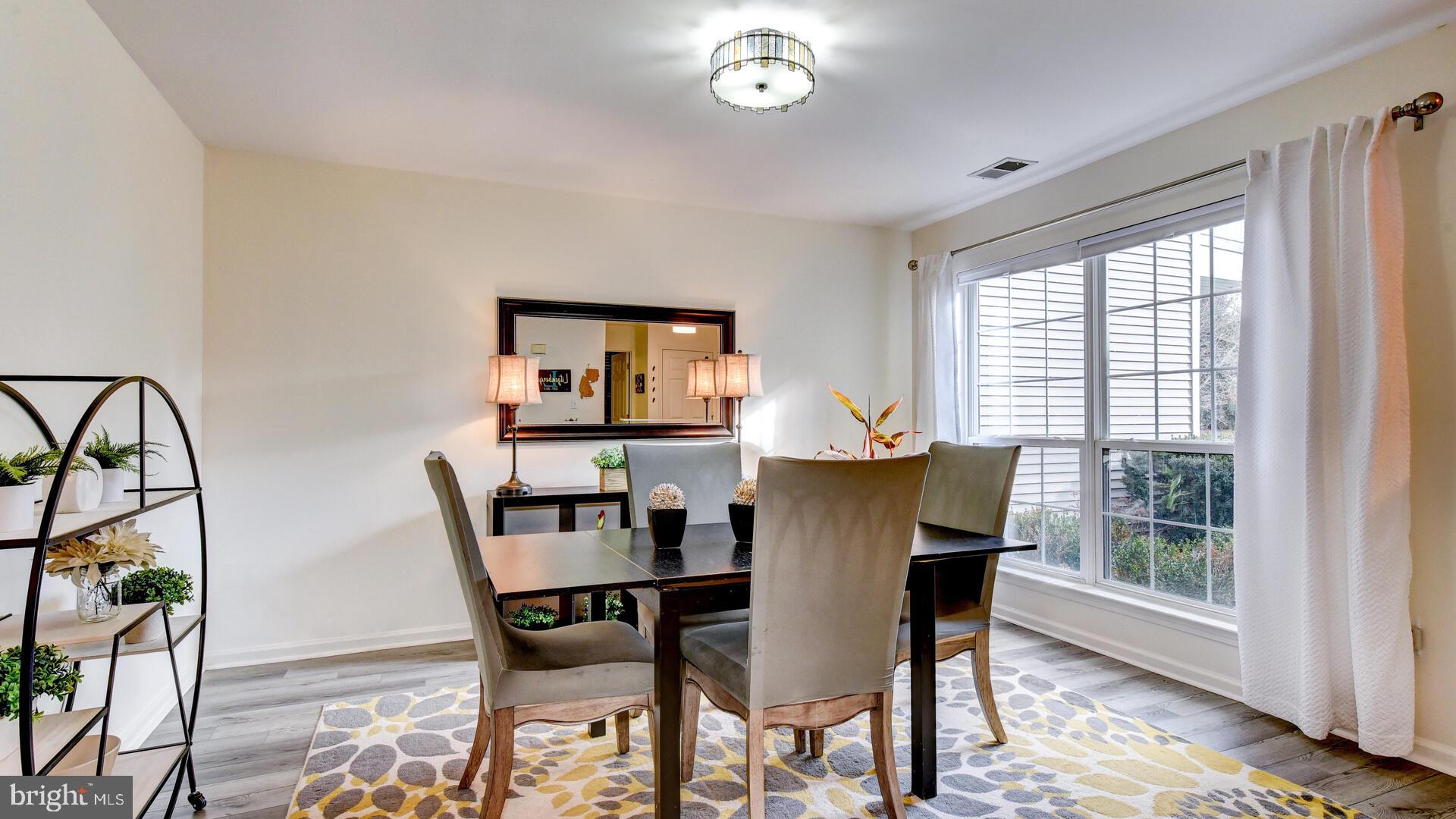 104 Coburn Road Pennington, NJ 08534 - Photo 6 of 40 a dining room with furniture and window