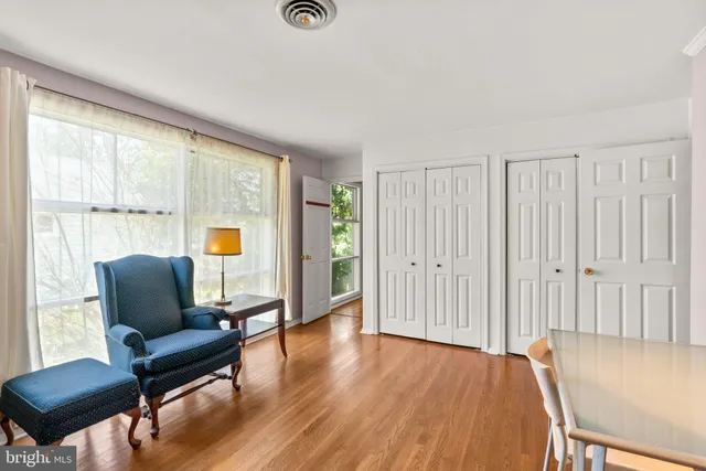 a bathroom with a granite countertop toilet a sink and a bathtub