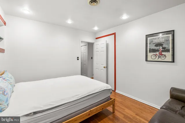 a bathroom with a shower and a sink