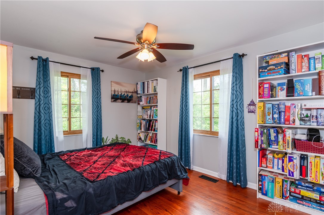 728 Chipplegate Drive Centerville, OH 45459 - Photo 20 of 30 This cozy bedroom features warm hardwood floors and abundant natural light.