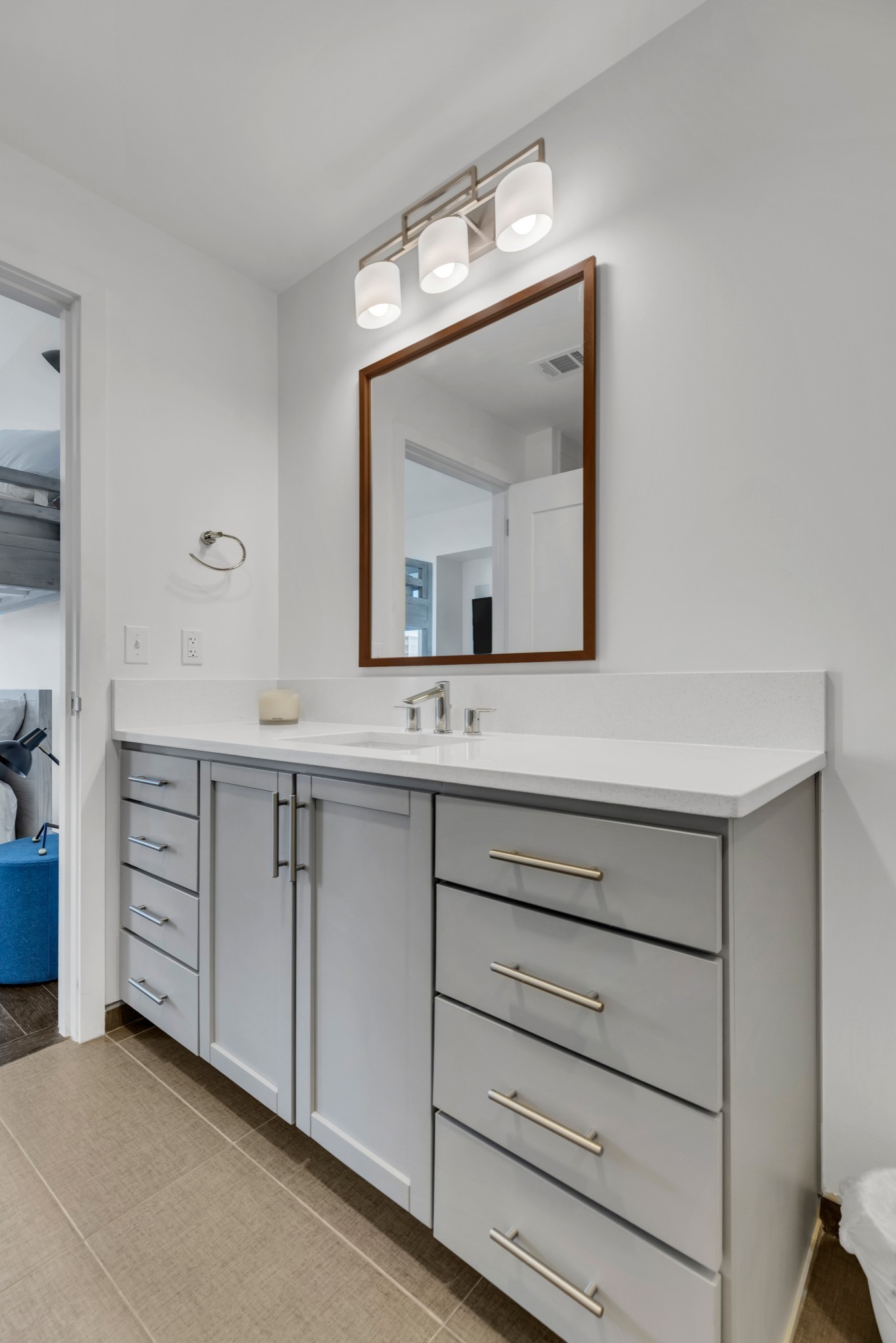 1212 Laurel Street, Unit 1815 Nashville, TN 37203 - Photo 18 of 42 a bathroom with a sink vanity and mirror