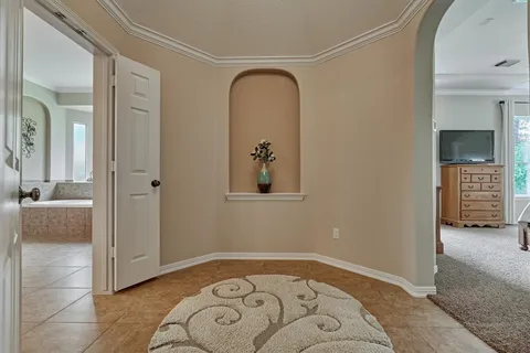 a view of room with window and bathroom