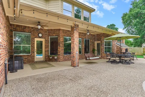 a view of a building with sitting area and porch