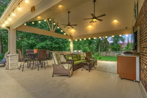 a view of a patio with a yard