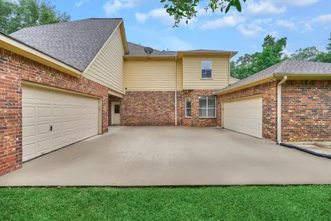 a view of a house with a garage