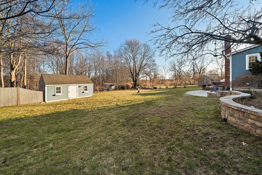 125 Driftway Scituate, MA 02066 - Photo 25 of 35 a view of a house with a yard