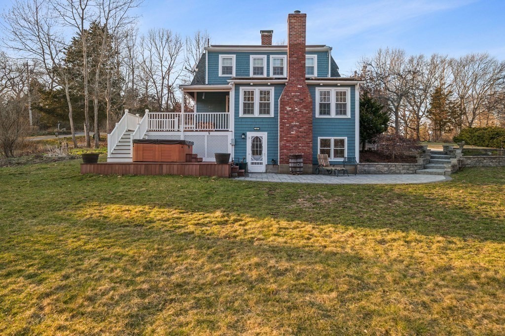 125 Driftway Scituate, MA 02066 - Photo 26 of 35 a view of a house with a big yard and large trees