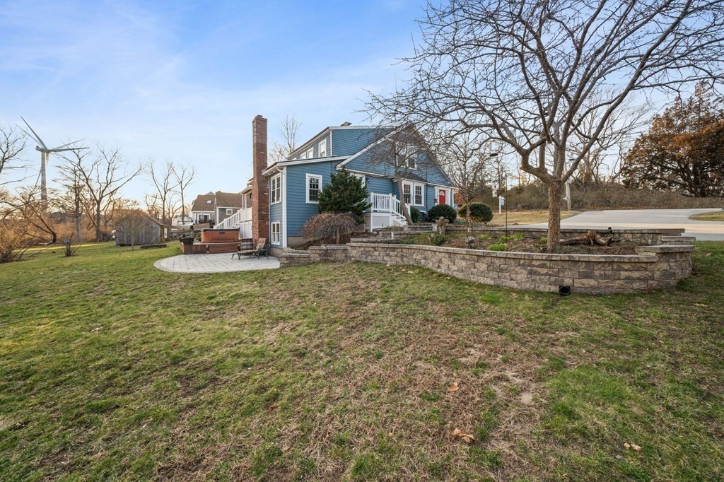 125 Driftway Scituate, MA 02066 - Photo 27 of 35 a view of a house with a yard