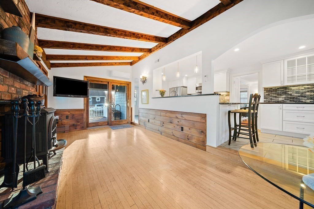 125 Driftway Scituate, MA 02066 - Photo 6 of 35 a view of a kitchen with cabinets and wooden floor