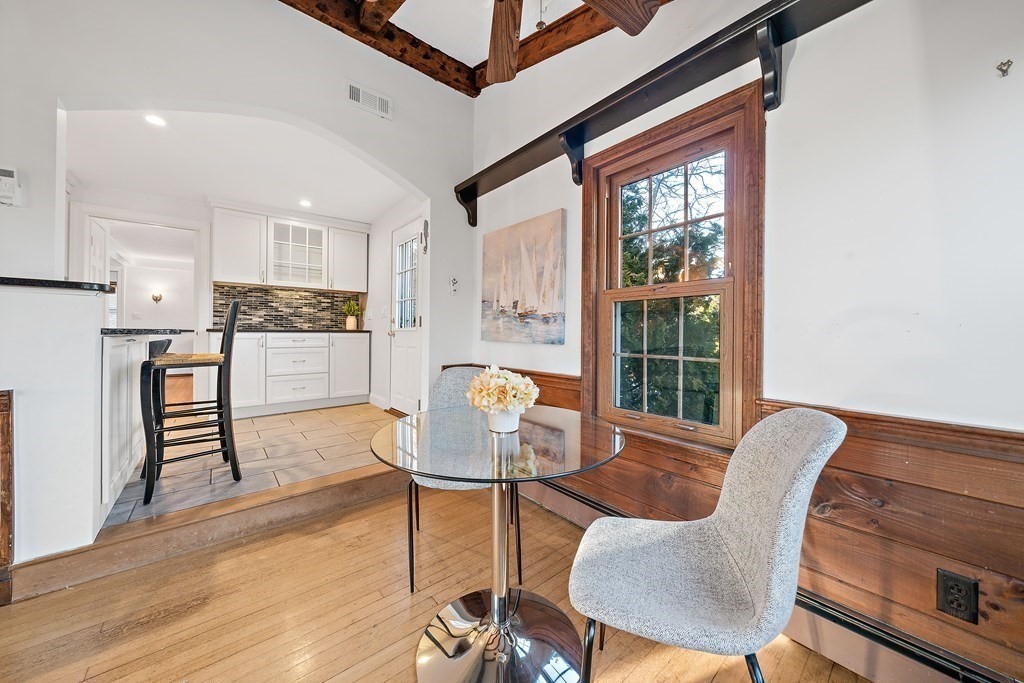 125 Driftway Scituate, MA 02066 - Photo 8 of 35 a dining room with furniture a window and wooden floor