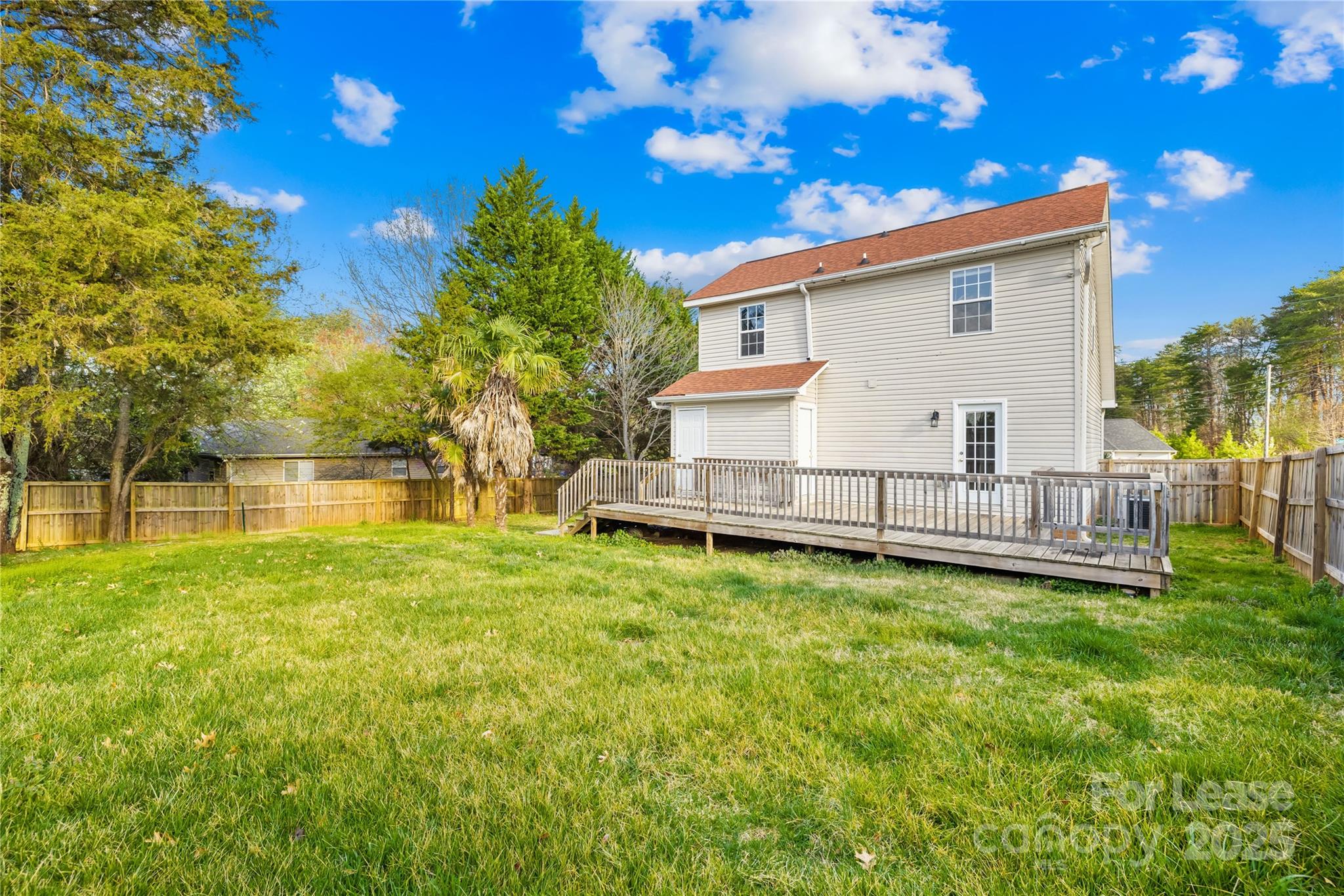 7610 Sarah Drive Denver, NC 28037 - Photo 14 of 17 a view of a house with a yard