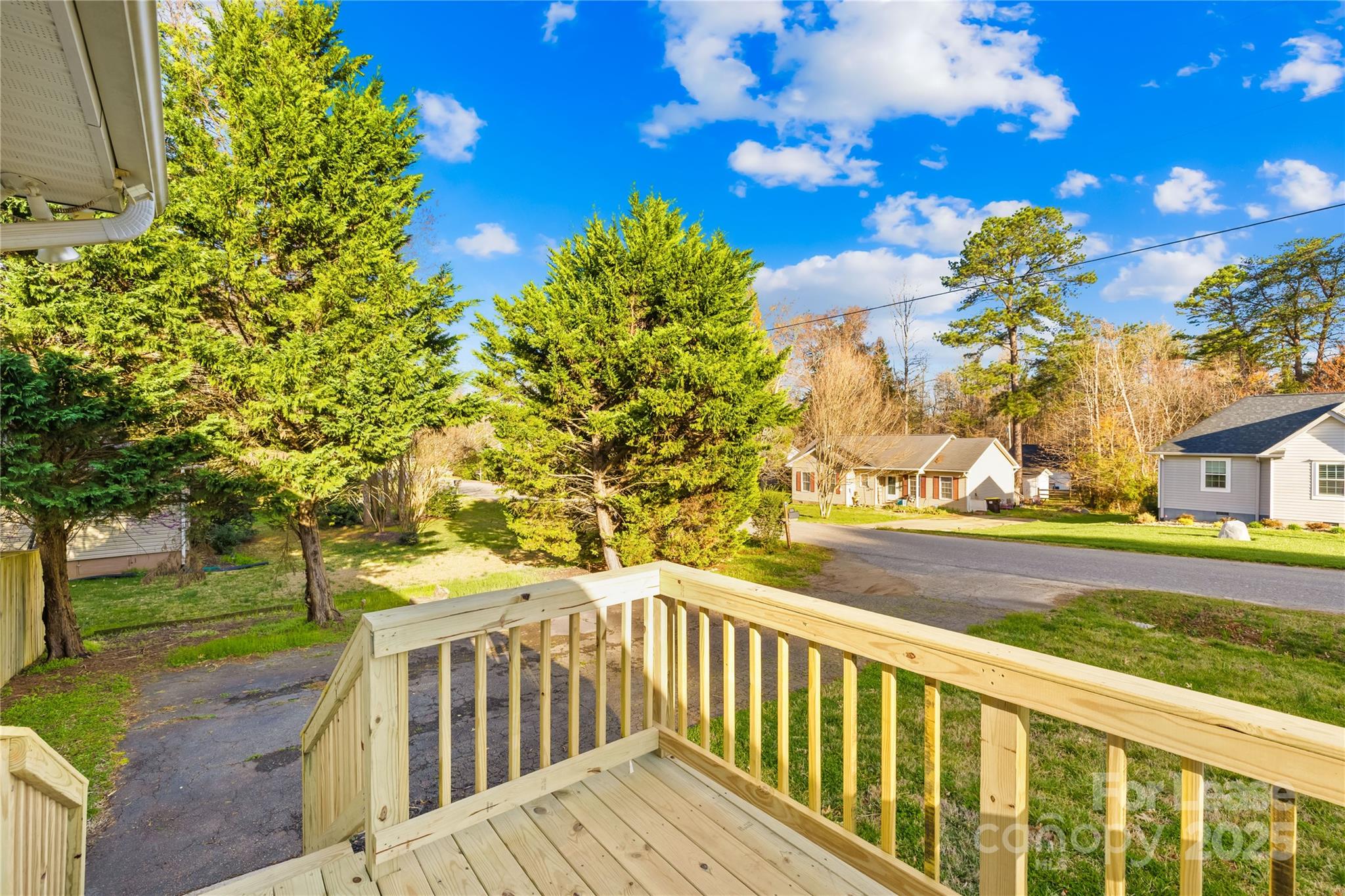 7610 Sarah Drive Denver, NC 28037 - Photo 16 of 17 a view of a yard with flower plants