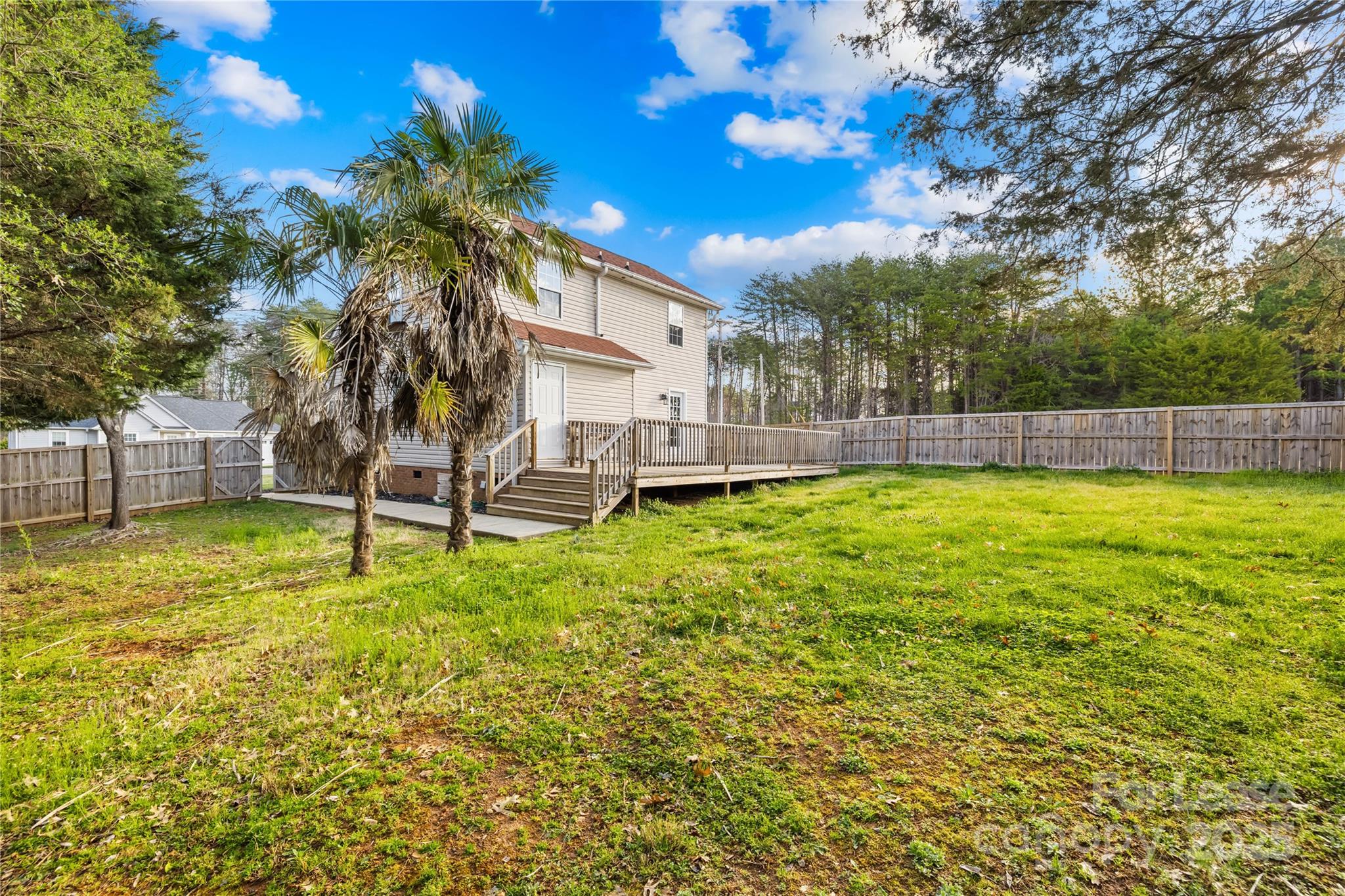 7610 Sarah Drive Denver, NC 28037 - Photo 17 of 17 a view of a house with a backyard