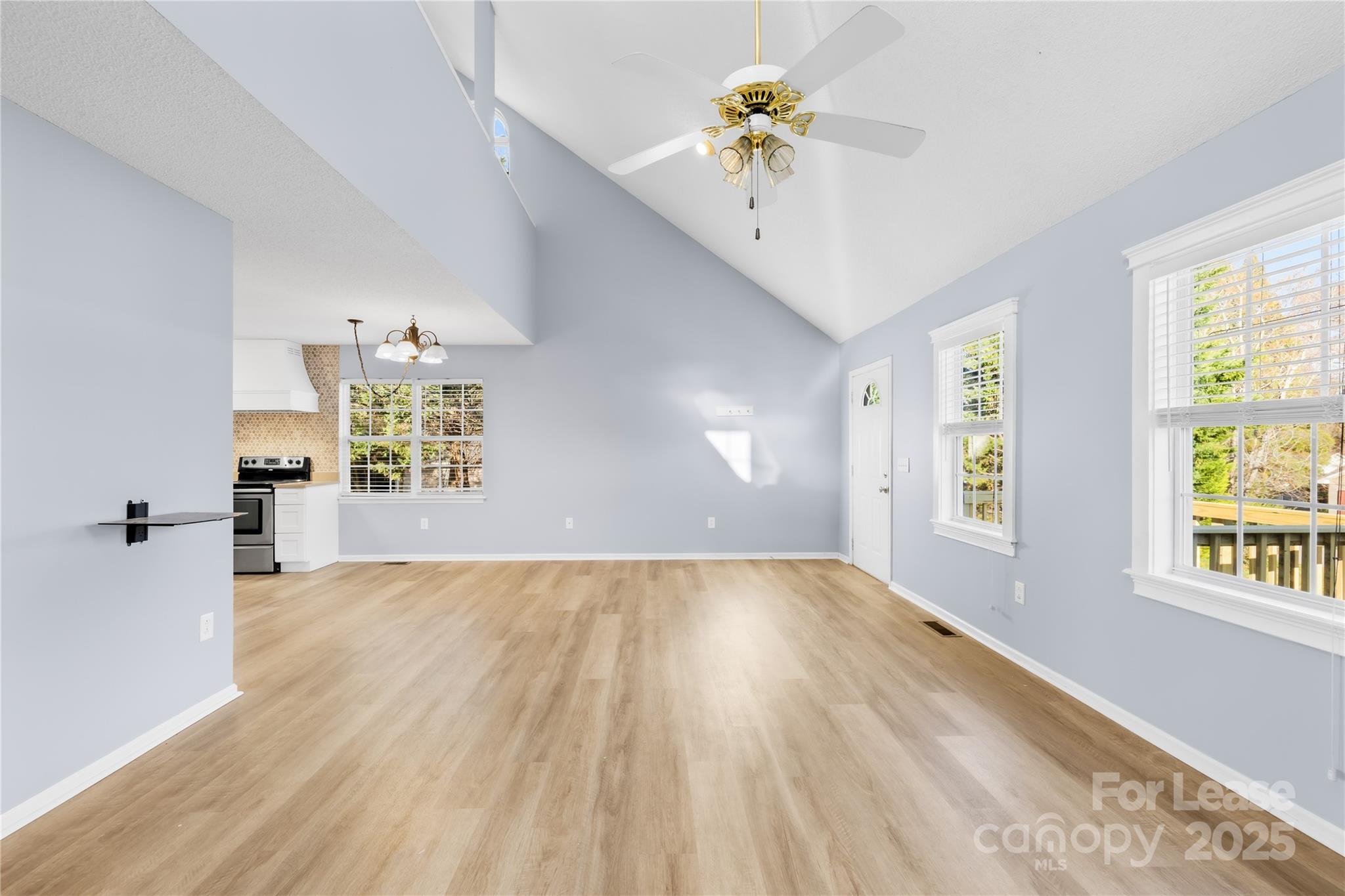 7610 Sarah Drive Denver, NC 28037 - Photo 4 of 17 wooden floor in an empty room with a window