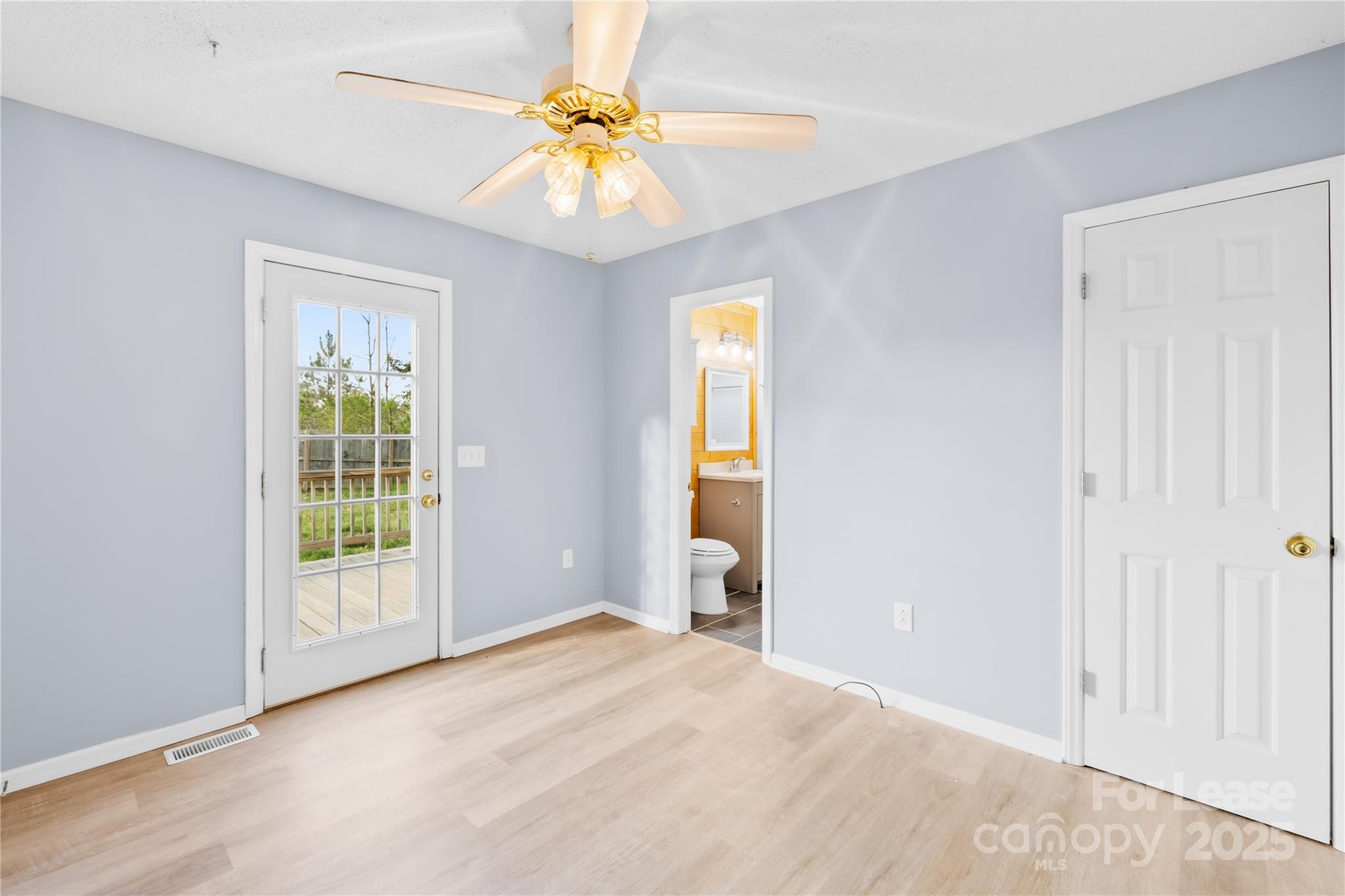 7610 Sarah Drive Denver, NC 28037 - Photo 8 of 17 an empty room with closet and a window