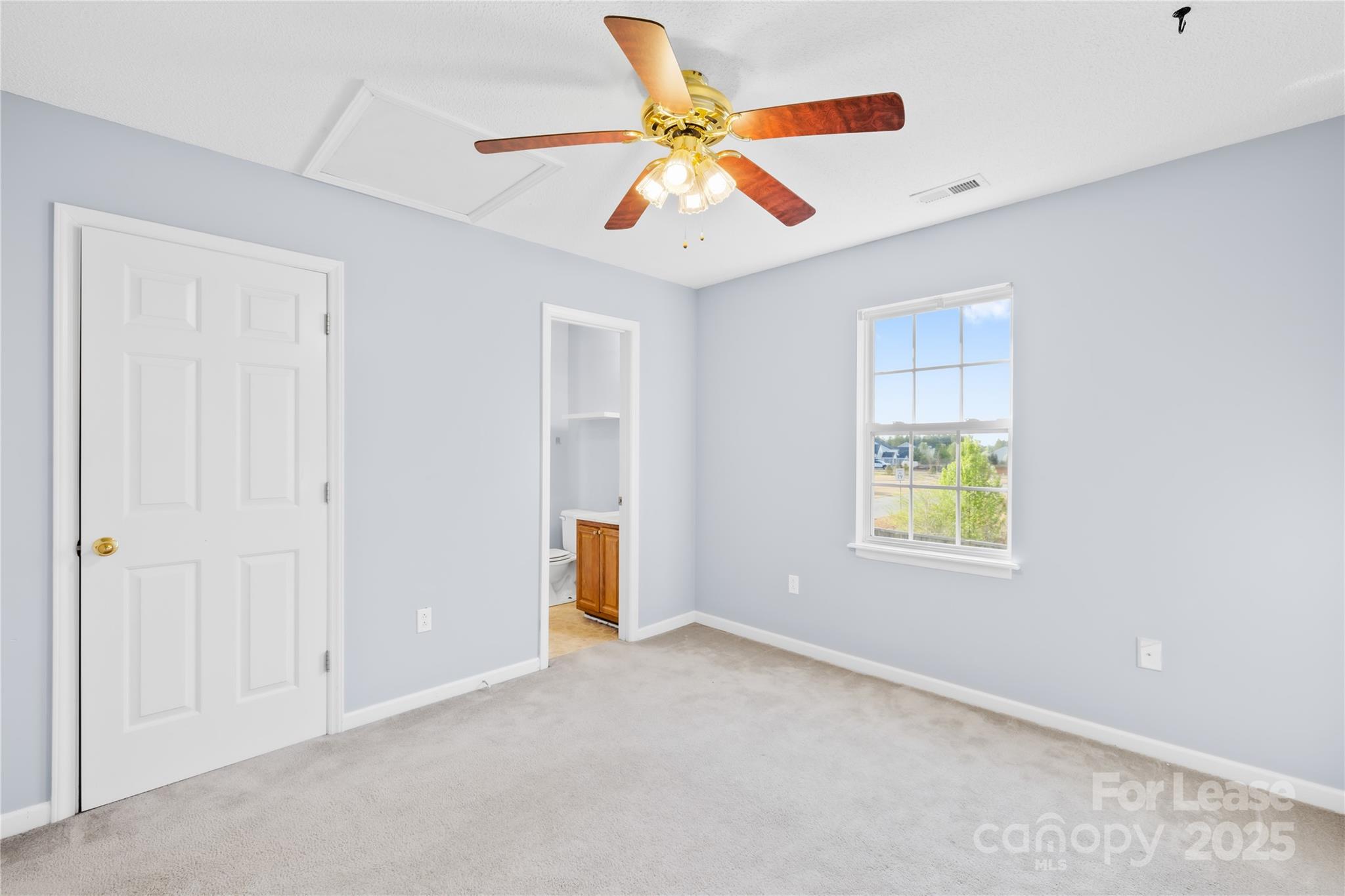 7610 Sarah Drive Denver, NC 28037 - Photo 10 of 17 a view of an empty room with a window