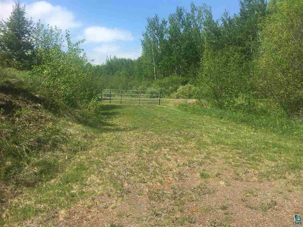 240 East St Louis River Road Duluth, MN 55810 - Photo 3 of 20 Circular Gravel Drive with 2nd Entrance Gated